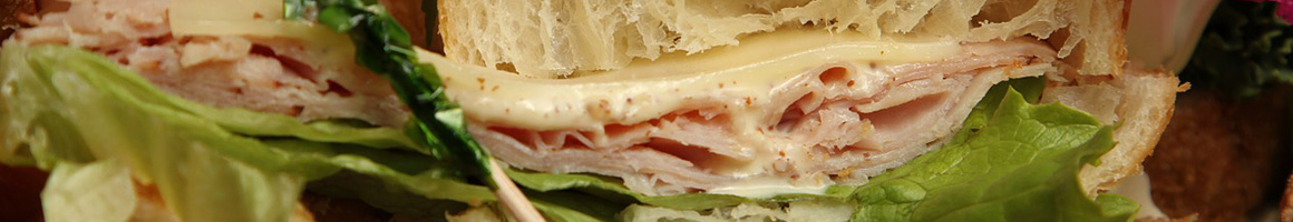 Eating Italian Pizza Sandwich at Bellacino's restaurant in Hermitage, TN.